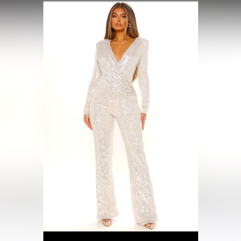Silver sequin's long sleeve body suit. Only worn once in great condition.